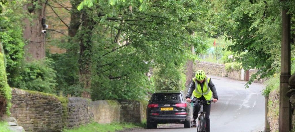 Cyclist in Esholt Village